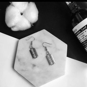 Razor blade earrings (not real blades)